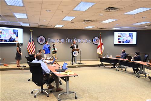 Mr. Parker at podium before the Board 